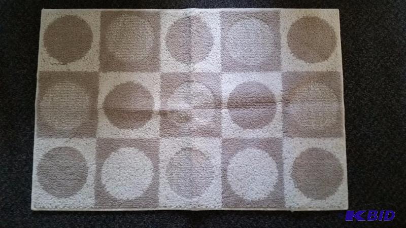 JCP Home Rug Tans. and Cream. Dots pattern.  Size 46 x 30  No Tags not used.