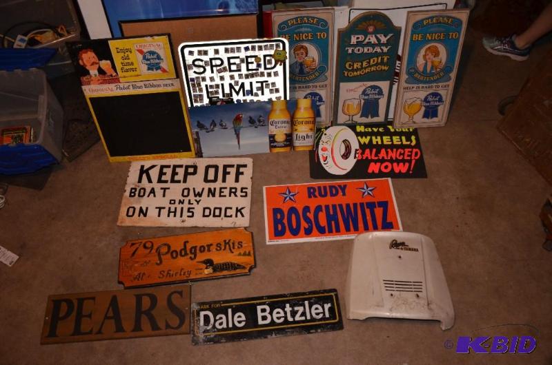 lot 119 image: Large lot of plastic metal and wood signs...