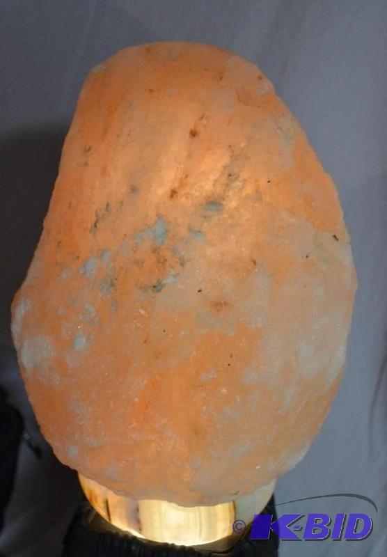 lot 168 image: Lighted salt rock 12x8". The center is h...