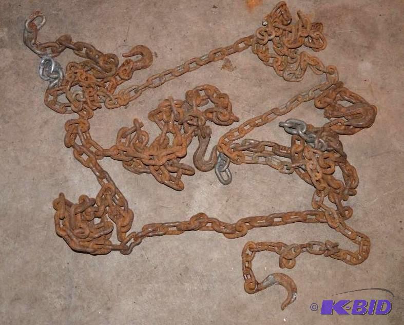 lot 180 image: Bucket of heavy duty log chains or Towing Cha...