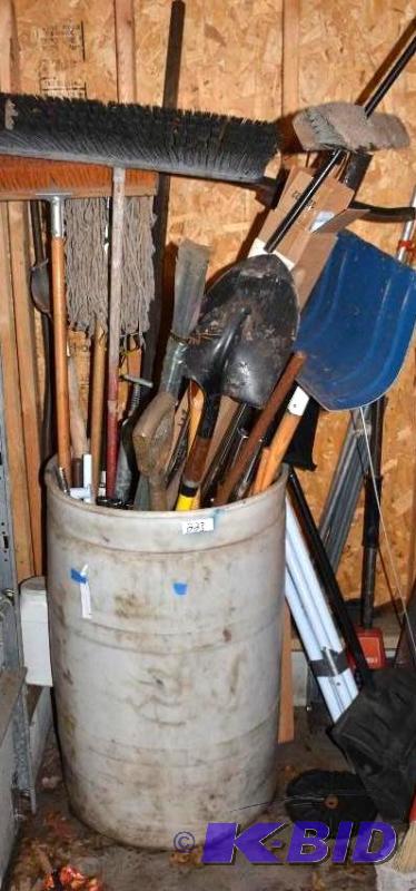 lot 223 image: Plastic barrel filled with gardening tools....