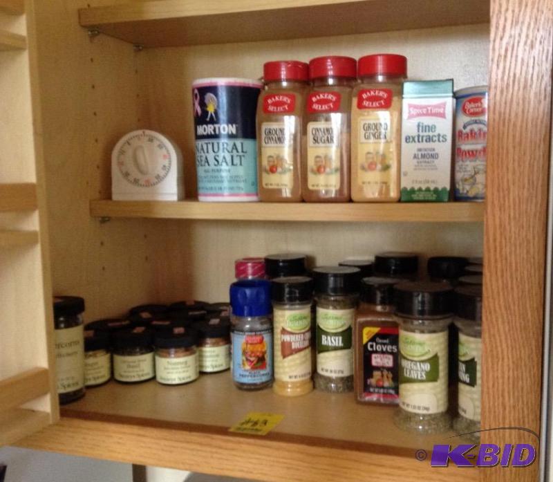lot 63 image: Two Cupboard Shelves of Spices and More