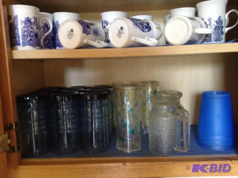 lot 76 image: Two Shelves of Glassware and Coffee Cups
