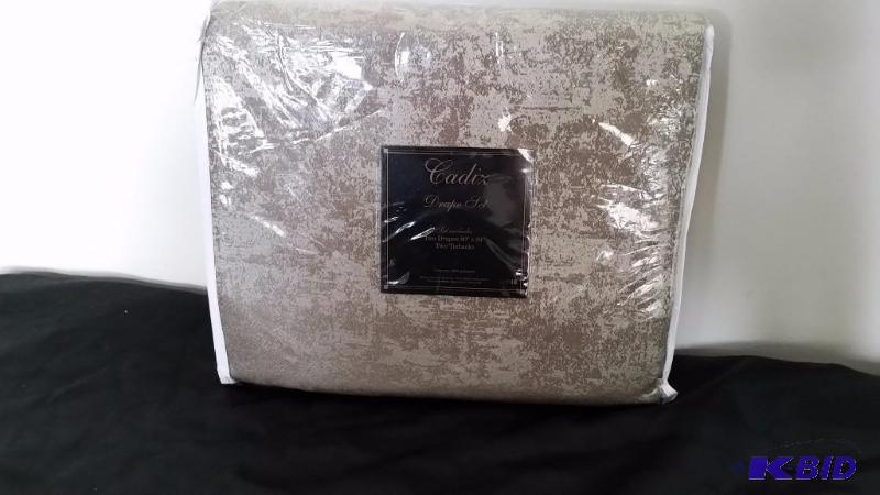 Cadiz Drape Set Set includes Two Drapes 80 x 84 and Two Tiebacks.  Dark champagne