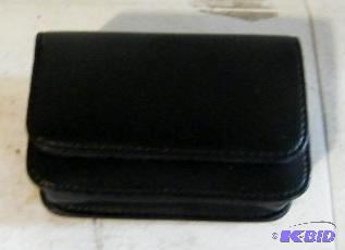 lot 14 image: Magnetic Leather Carrying Case - Has a belt c...