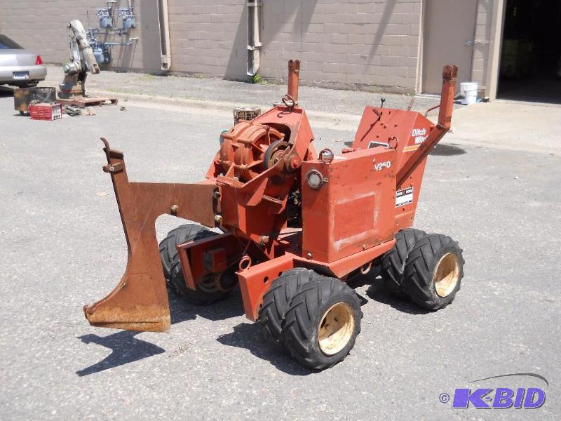 lot 8 image: Ditch Witch V250 Cable Plow. Starts, Runs and Drives.
