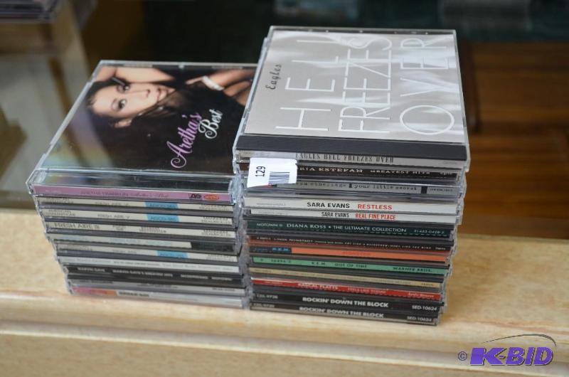 lot 129 image: 30 music cds...