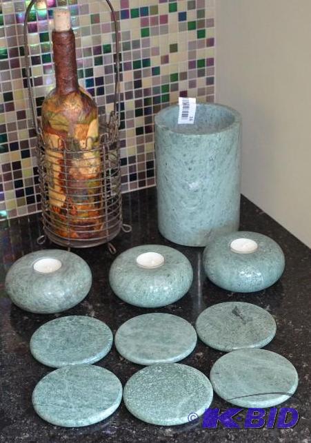 lot 16 image: Set of marble coasters and matching candle ho...