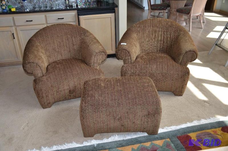 lot 3 image: 2 Brown stuffed Chairs 40" wide with Ott...