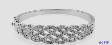 lot 40A image: Stunning 14 CTTW Diamond Bangle Rhodium Cove...