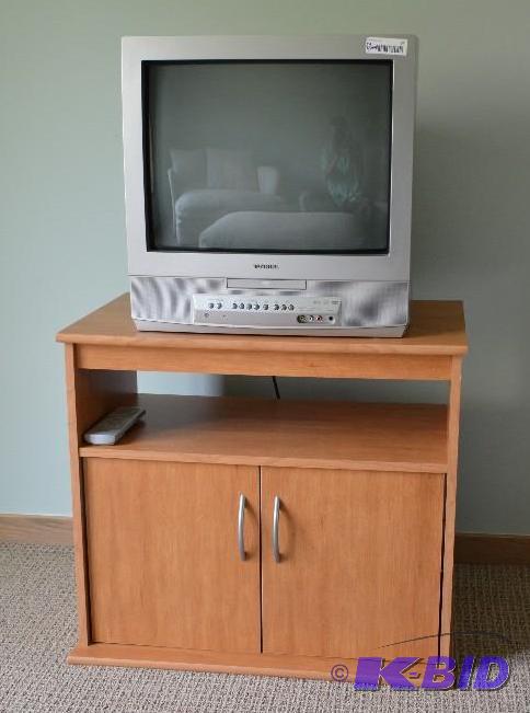 lot 64 image: Toshiba Big Screen TV on 2 door stand. TV has...