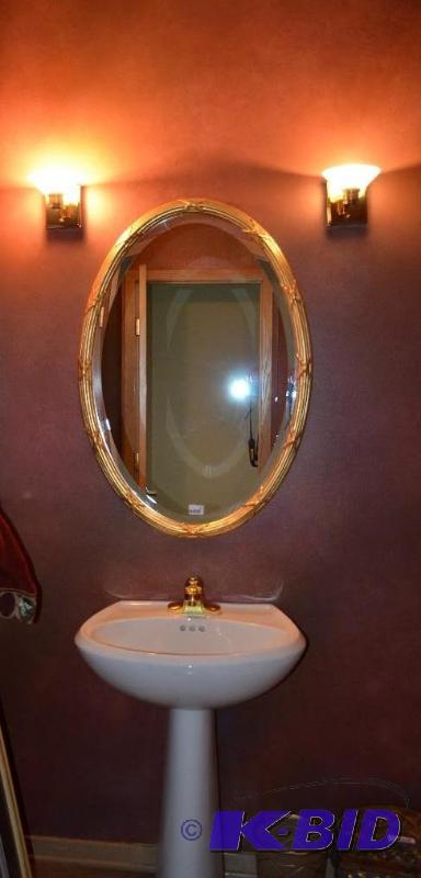 lot 68 image: Framed Oval mirror - measures 28 x 38. please...