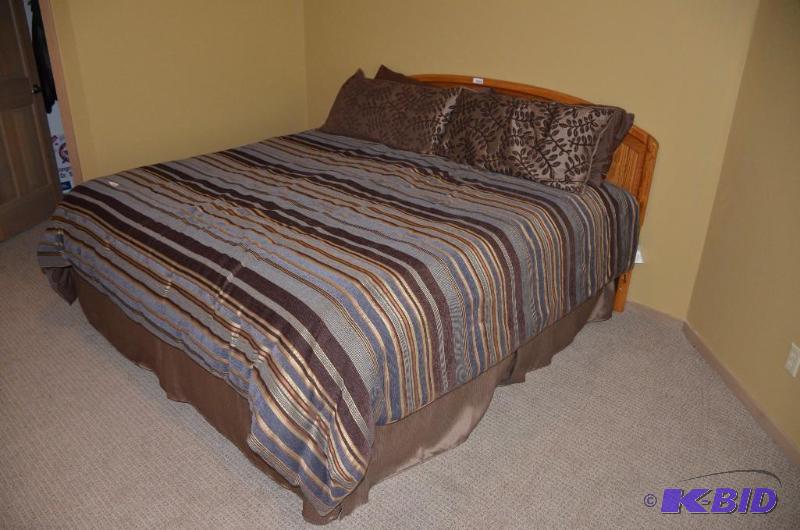 lot 70 image: Brown striped Coverlet and Pillows with bed s...