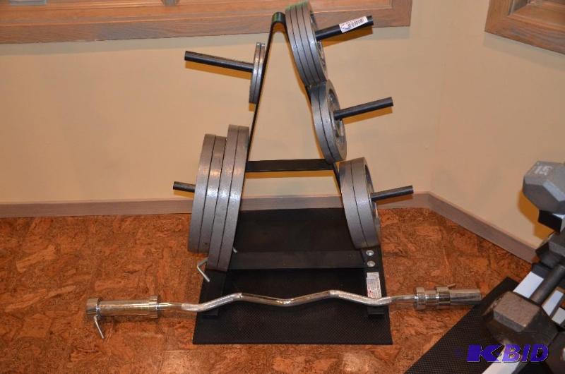 lot 98 image: Barbell Weights and stand by Parabody, Seriou...