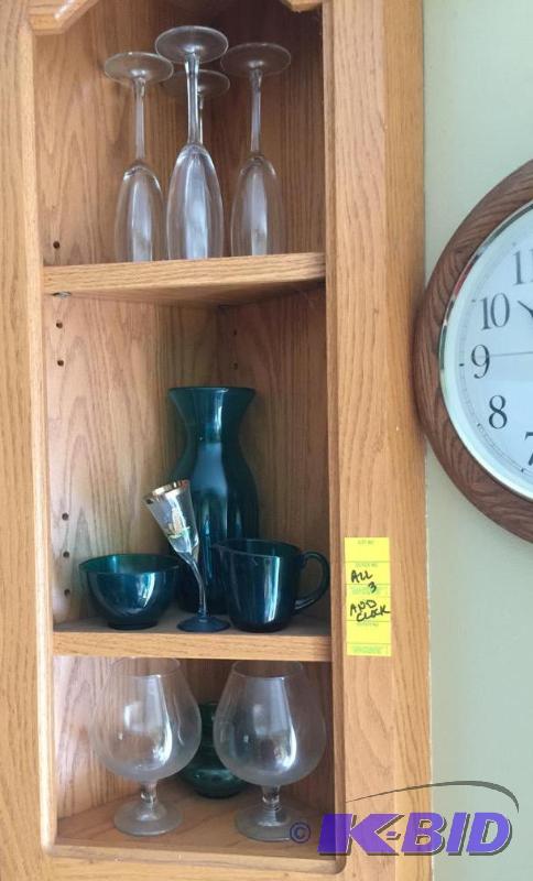 Corner Shelf of Glassware and Wall Clock