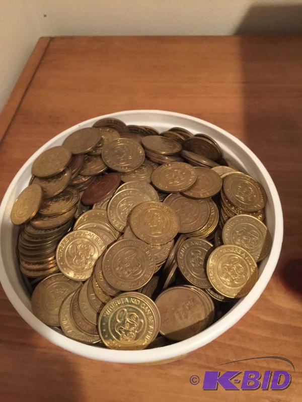 Plastic Container Chock Full of Tokens