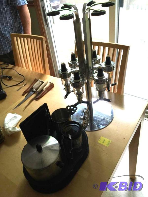 Revolving Liquor Dispenser and Bar Tender Tools