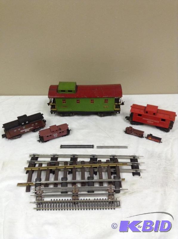 lot 219 image: Collection Different Gauge Railroad Cars & Tracks
