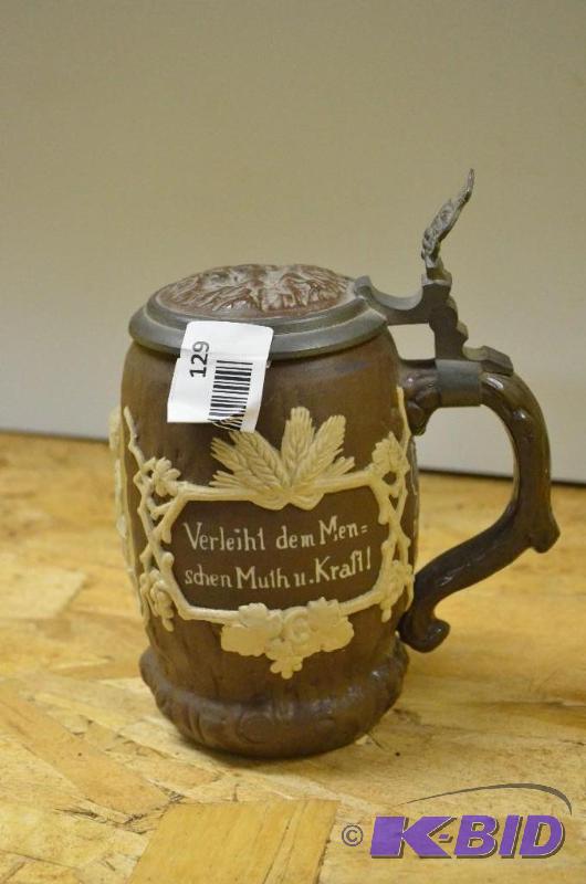 lot 129 image: Antique Beer Stein Bas Relief by Villeroy &am...