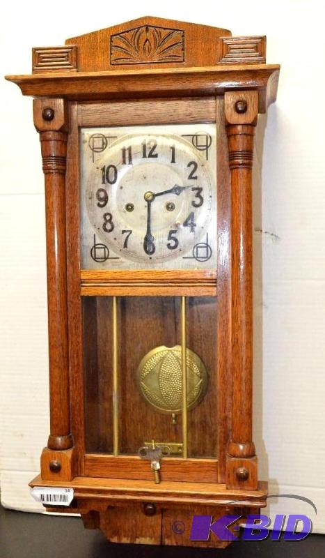 lot 14 image: Antique E.N. Welch Co. Wood Pendulum Clock me...
