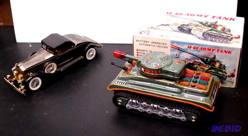 lot 187 image: Vintage TIN Battery operated automatic action...