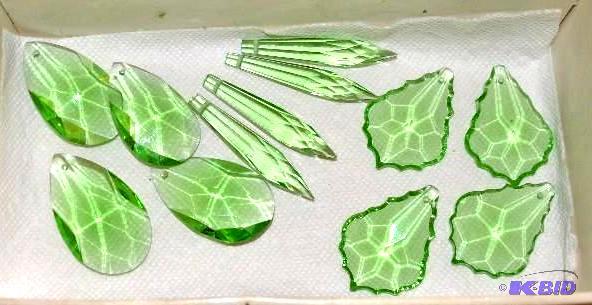 lot 243 image: Green glass colored crystals for hanging on l...