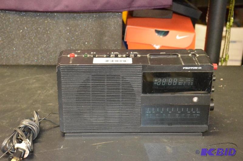 lot 28 image: Proton 320 AMFM Clock Radio, serial number P...