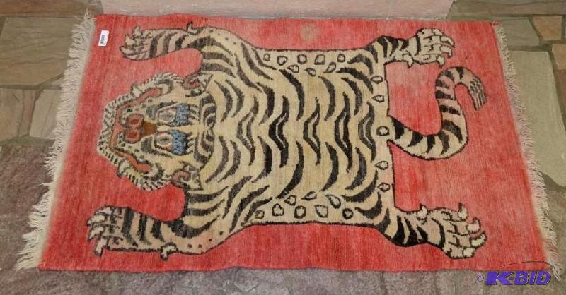 lot 78 image: Tibetan Prayer Rug, measures 36.5 x 58 inches...