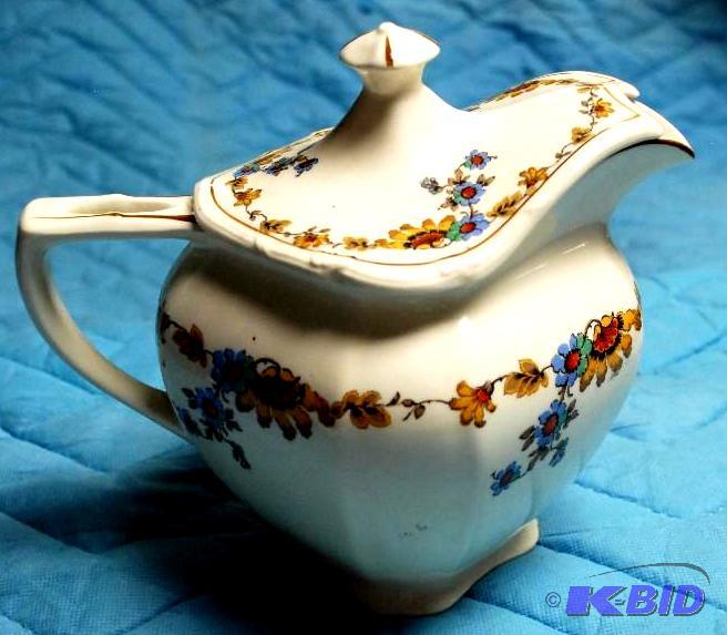 lot 83 image: Paramount ivory Tea&nbspPot and   ...
