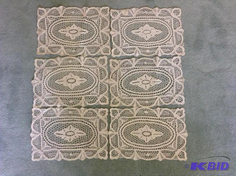 lot 129 image: Six Hand Made Lace Placemats