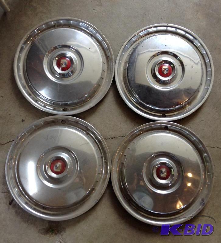 lot 193 image: Nice Set of Four 56 Ford Hubcaps