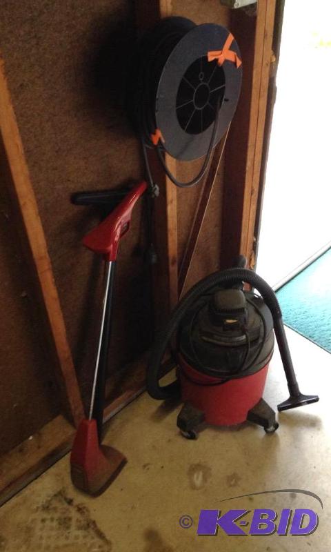 lot 202 image: WetDry Vac - Coiled Extension Cord and Toro Weed Trimmer