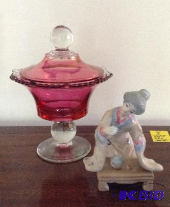 lot 39 image: Cranberry Flashed Candy Dish with Lid and Asian Woman Figurine