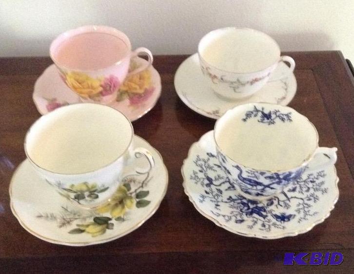 lot 41 image: Four Pretty Cup and Saucer Sets