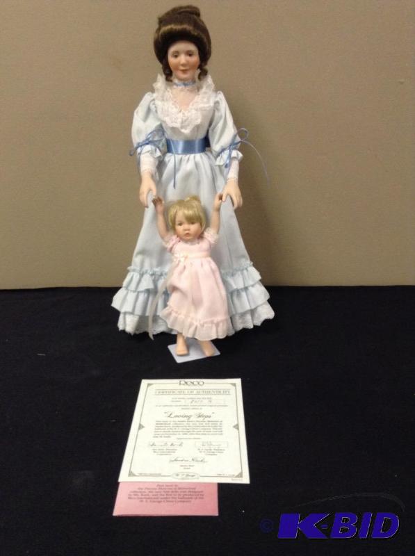 lot 26 image: Loving Steps Porcelain Dolls