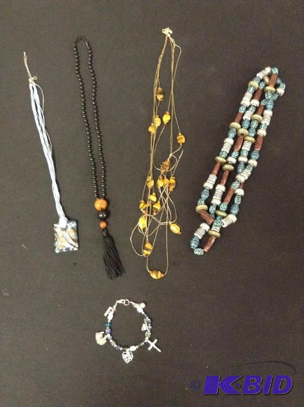 lot 22 image: 4 Fashion Necklaces & Bracelet