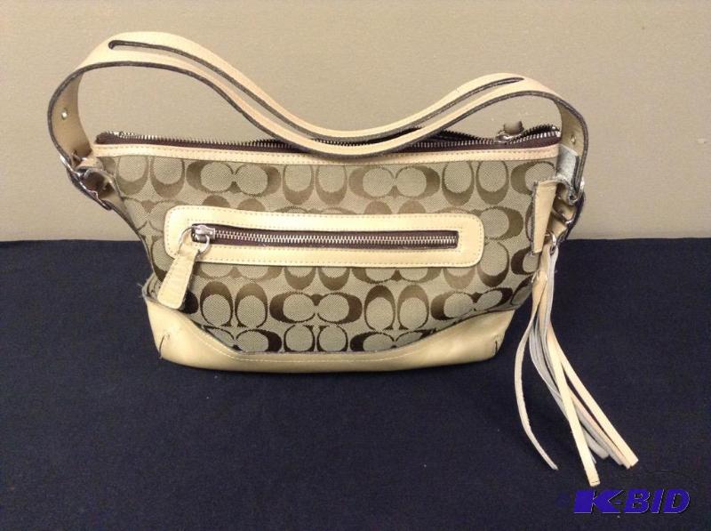 lot 27 image: Tan Coach Purse Handbag