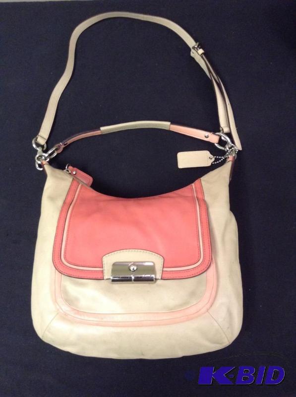 lot 32 image: Melon Colored Coach Purse Handbag