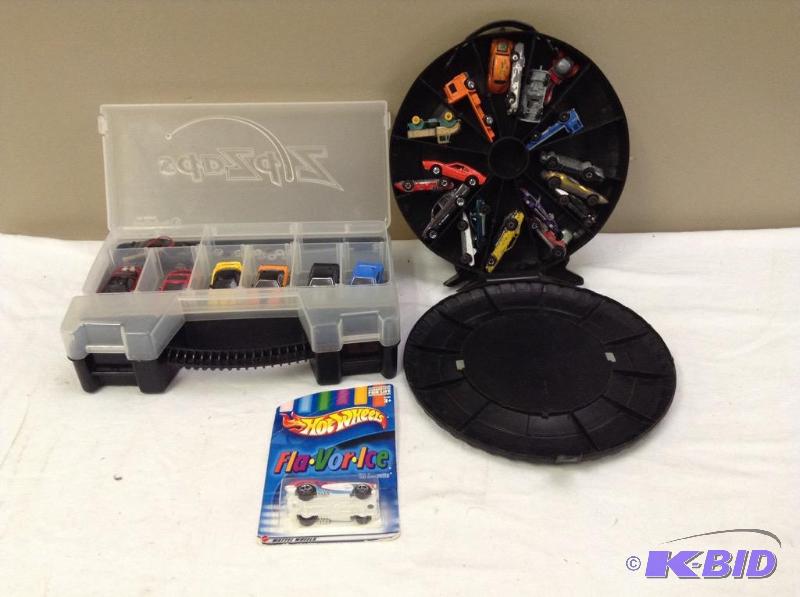 lot 33 image: Vintage Red Line, Revvers Hot Wheels case and Radio Shack ZipZap remote cars set