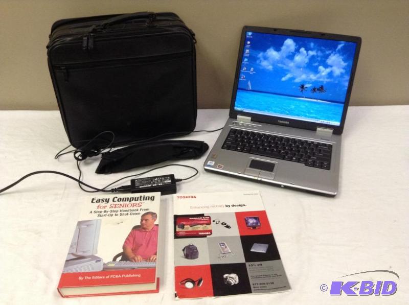 lot 36 image: Toshiba Satellite L25-S119 Laptop Computer Model #PSL2XU-00J00D , and case