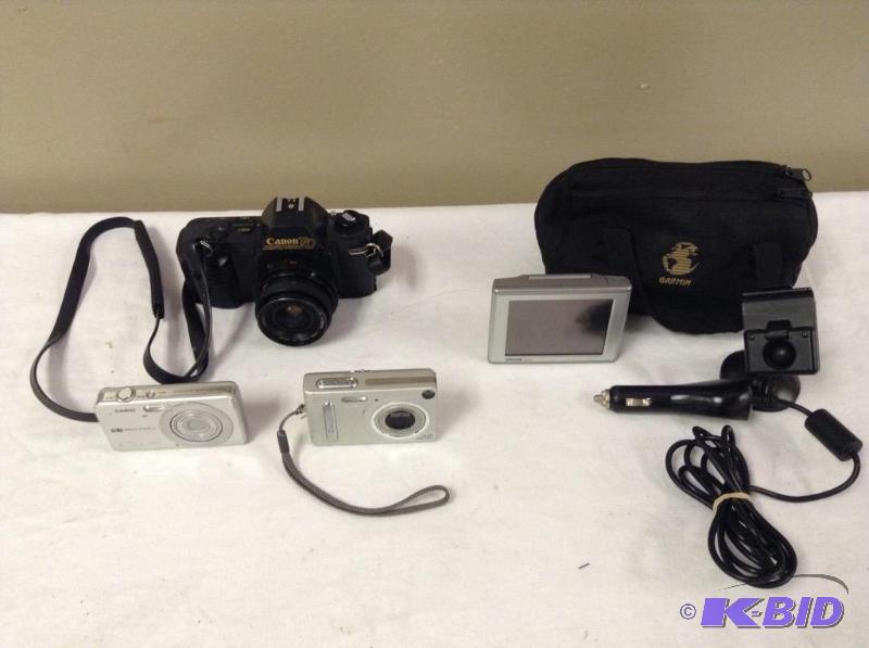 lot 66 image: Point & Shoot Digital Cameras & Canon T50