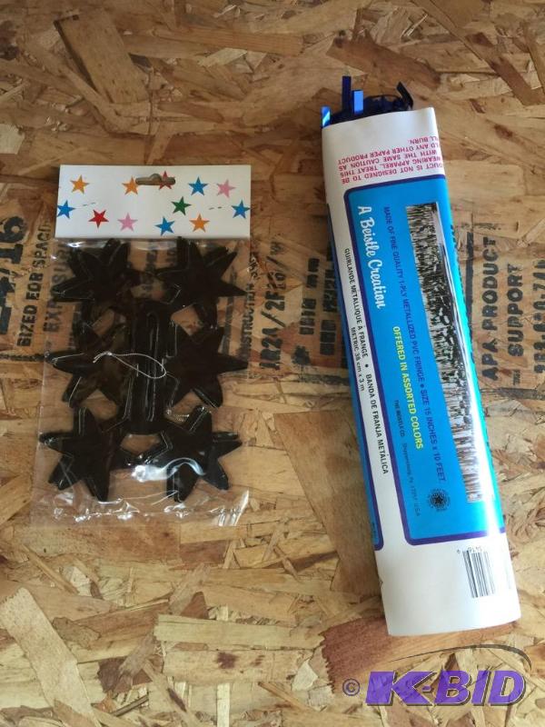 lot 153 image: Metallic Fringe Drapes and Black Star Garlands