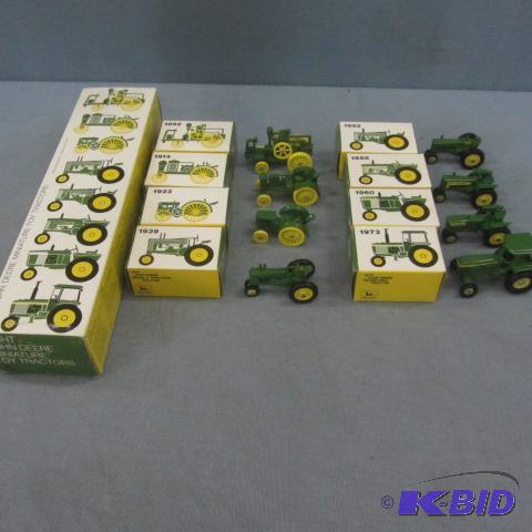lot 102 image: JD Miniature Toy Tractors