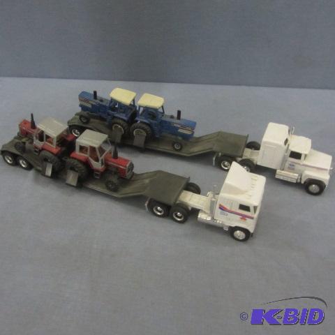 lot 111 image: MF, Ford, NH Haulers