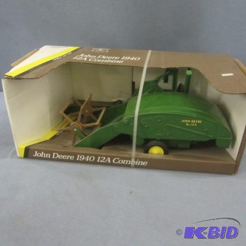 lot 17 image: John Deere Toy Combine