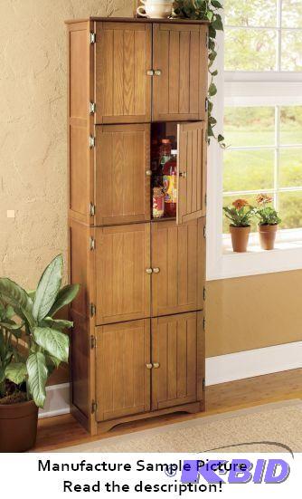 lot 46 image: Oak Finish 8 Door Pantry Cabinet - Make the m...