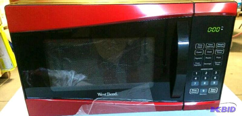 lot 3 image: West Bend Microwave Oven