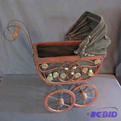 lot 203 image: Wicker Doll Buggy