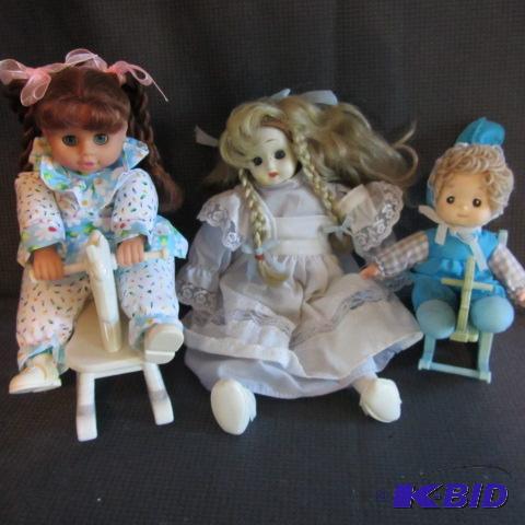 lot 207 image: Dolls on Rocking Horses