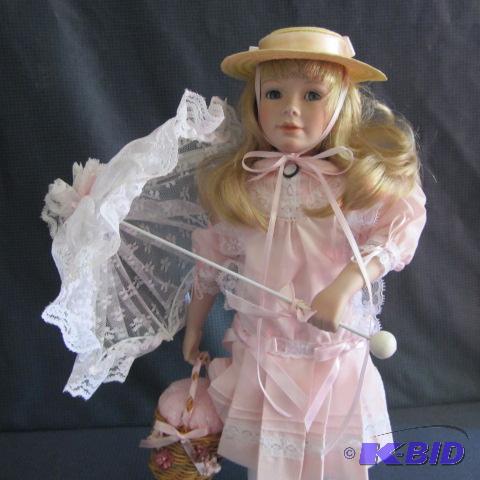 lot 22 image: Doll with Parasol & Basket